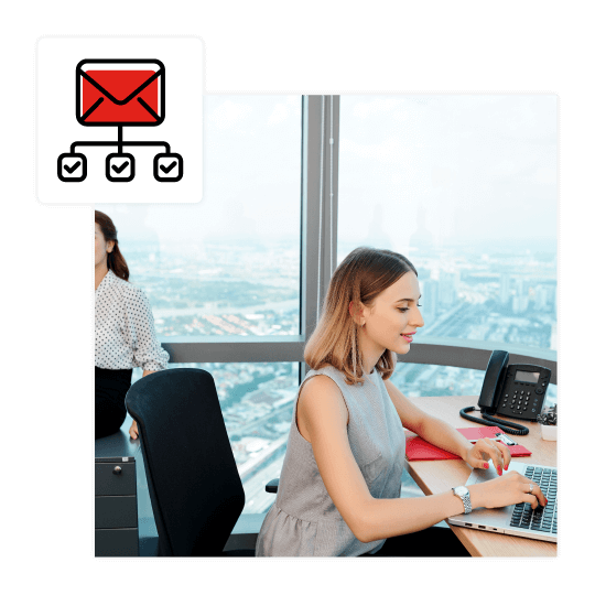 a woman sitting in an office overlooking houston texas