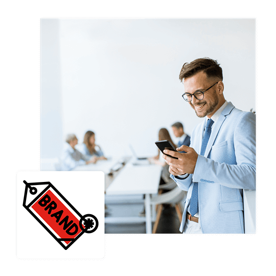 man-wearing suit reading brand strategy services