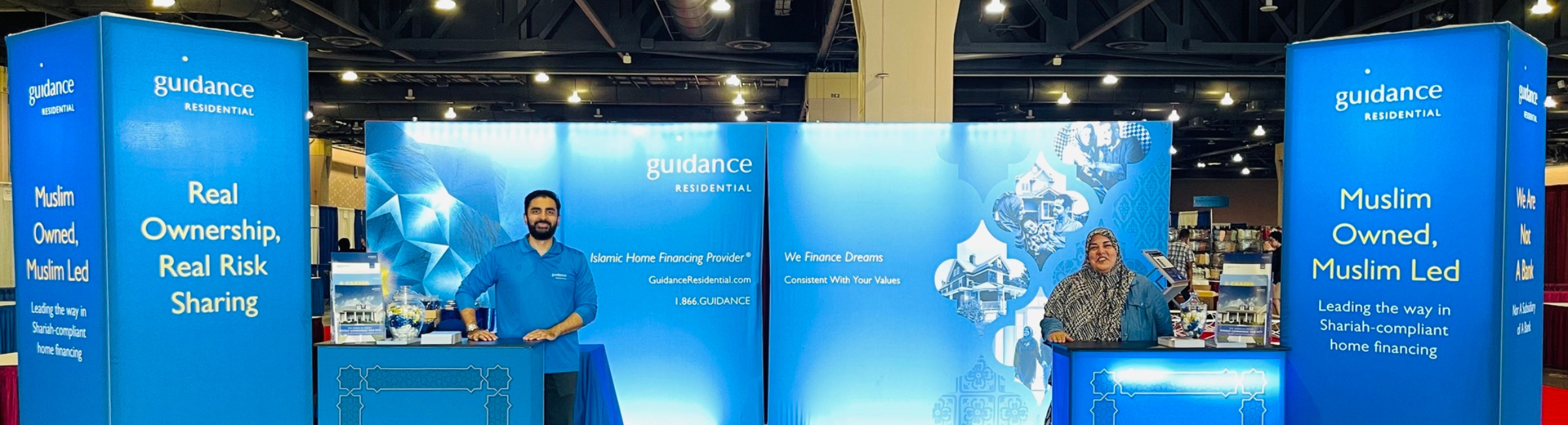 Guidance Residential team at an Islamic home financing expo booth showcasing Shariah-compliant mortgage solutions