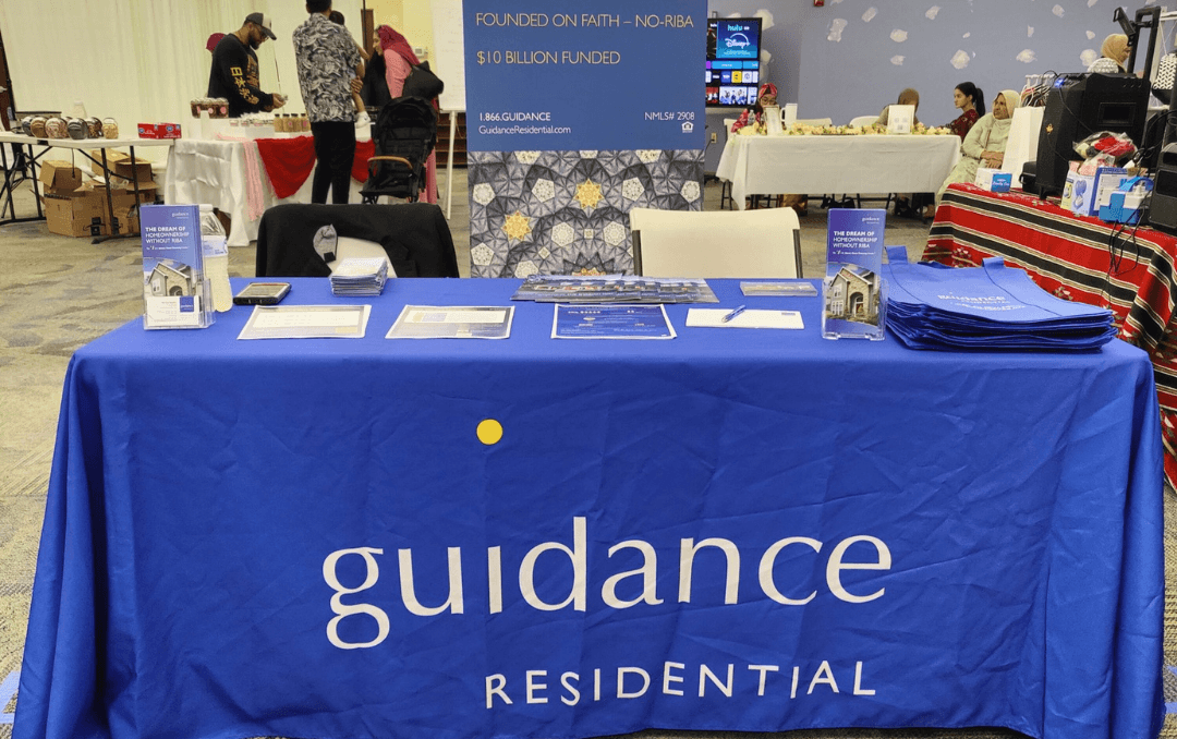 Guidance Residential branded booth at a Muslim community event displaying most trusted brand in US Islamic home financing, certified by independent Shariah board, with $10 billion funded